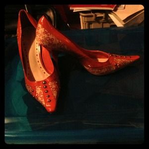 Orange logo BCBG pointed toe stilettos