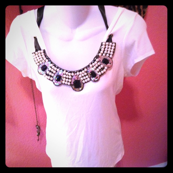 Cream colored cotton top with embelishment