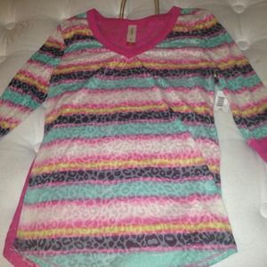 Leopard print multicolored shirt.