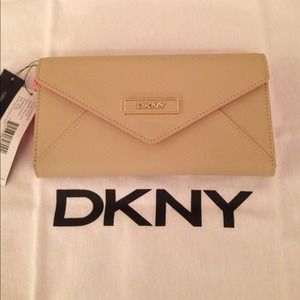 **Sold on eBay** DKNY tan leather wallet