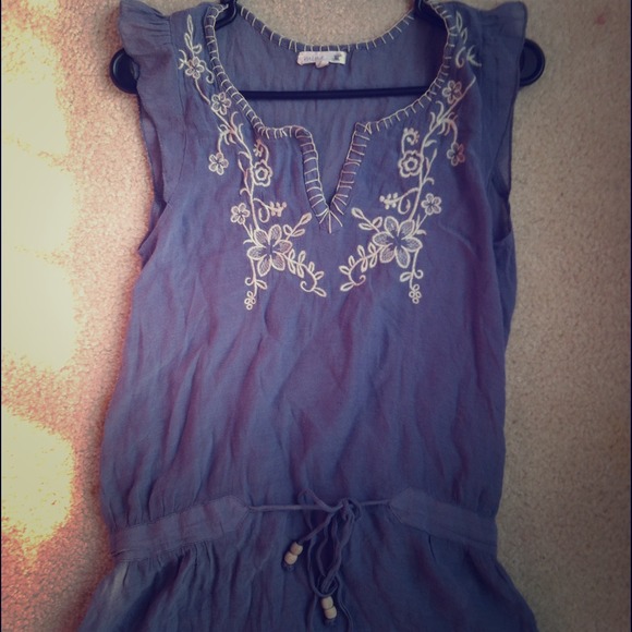 Blue shirt with floral detailing