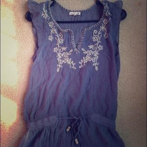 Blue shirt with floral detailing