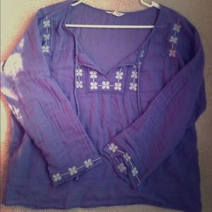 Purple shirt with floral detailing