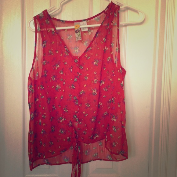 Sheer sleeveless top.