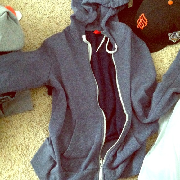 Blue zip up.