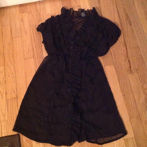 **SOLD** Black long blouse with ruffles.