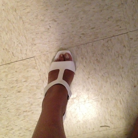 Size 7 pair of white heels