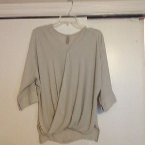 Cool high low top with wrap effect.