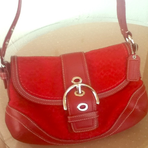 It's Coach!!! It comes with its wallet!!!