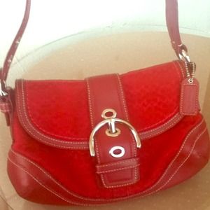 It's Coach!!! It comes with its wallet!!!