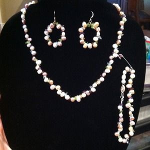 Fresh water pearls with genuine multi geme