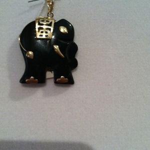 Elephant onyx with gold pendant.