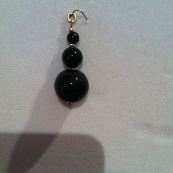 Three stacked Onyx with 14k gold pendant