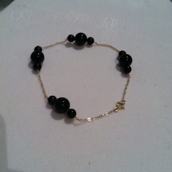 Onyx on 14k gold bracelet