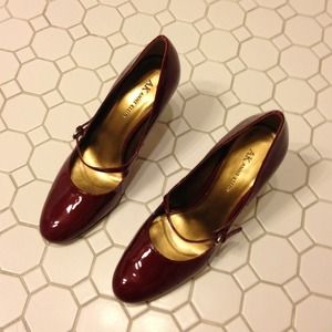 Red patent leather Mary Janes.