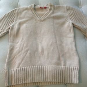 Beige colored sweater. Size Small.