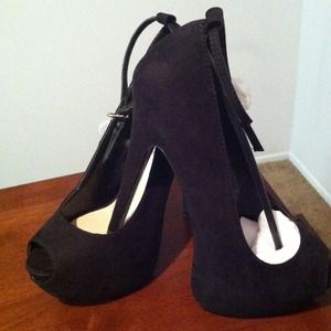 Black stilettos with ankle strap....never worn