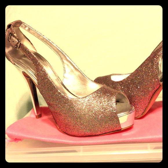 Guess silver glitter women's shoes.