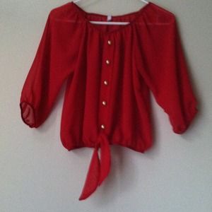 Beautiful red blouse with gold buttons.