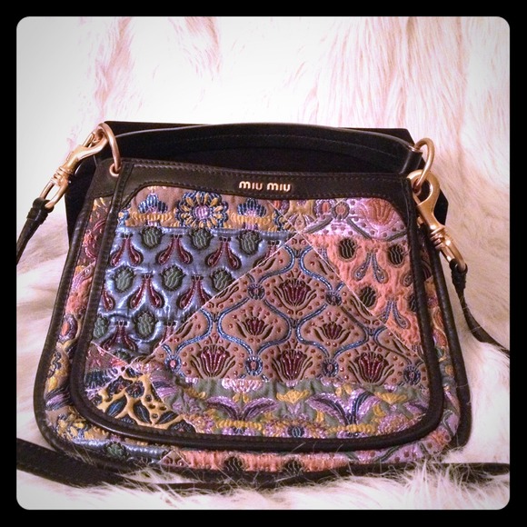 miu miu Handbags - Miu Miu embroidery bag 💯authentic (used)