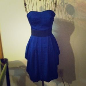 On hold w/ red dress