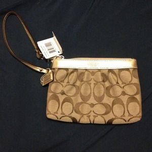 Authentic Coach gold and brown wristlet