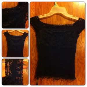 Black top with lace and sparkly sequins and beads