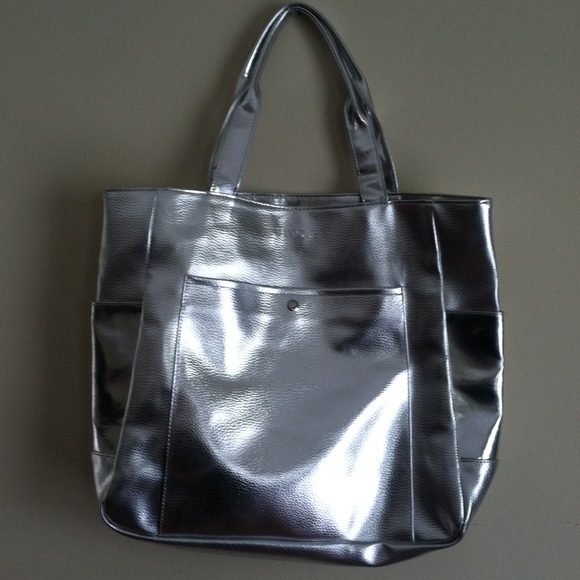Sold* Silver Clinique bag