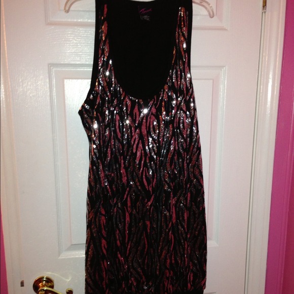 Cute black party dress that has sequin snake