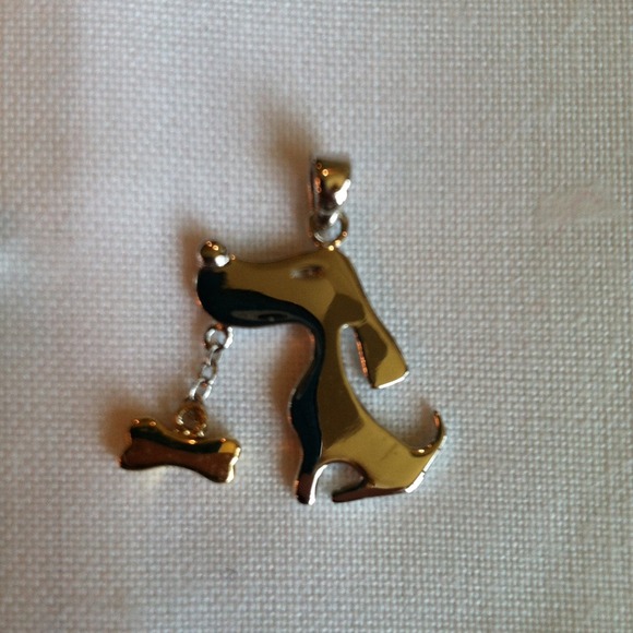 Silver dog with gold bone pendant
