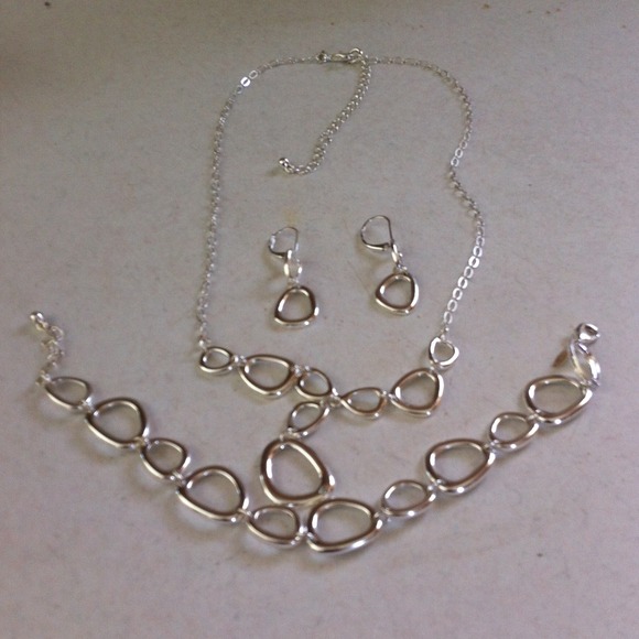 Necklace, Bracelet, and Earring set.