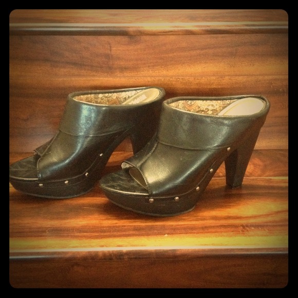 Black 4inch heel clogs with studded detailing