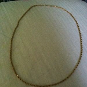 Long gold necklace