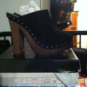 Brand new suede clogs.