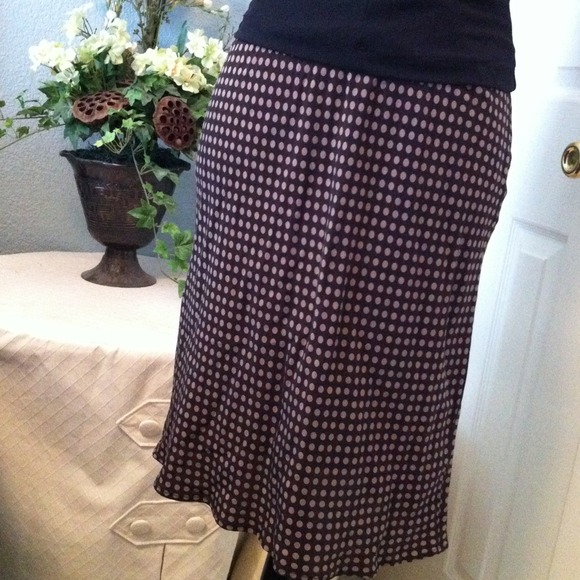 100% silk black w/ brown dot skirt.