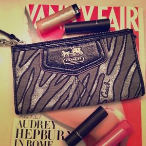 Authentic coach clutch