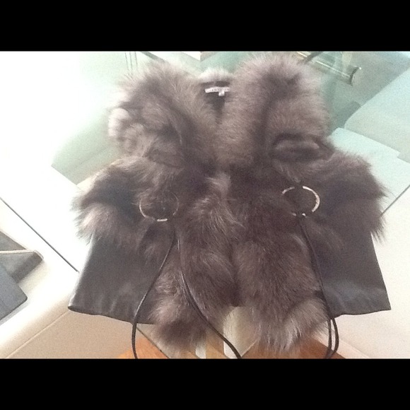 Tempo Paris genuine fox fur and leather vest.