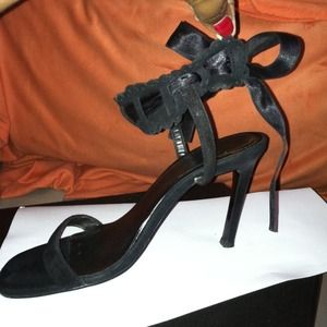 Black sandal tie around ankle with ribbon