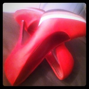 Red pumps with a little bit of brown and tan