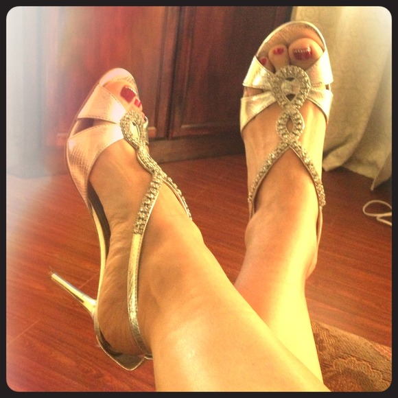 Silver aldo heels with rhinestone detail.