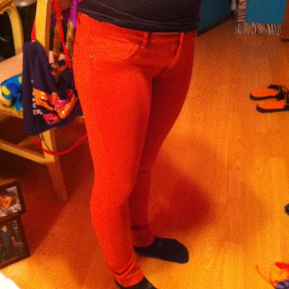 A pair of starchy orange jeans…