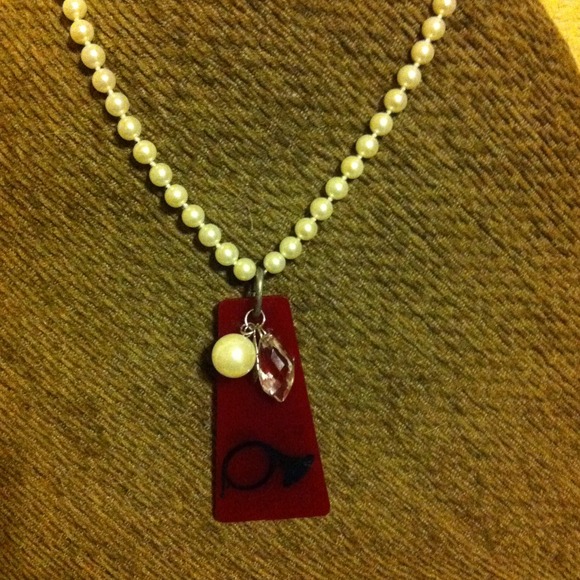 Old hotel key fob necklace
