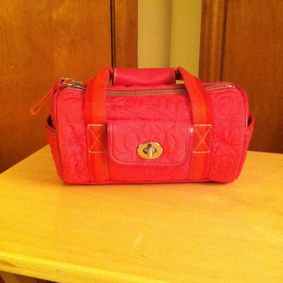 Pink Coach barrel bag