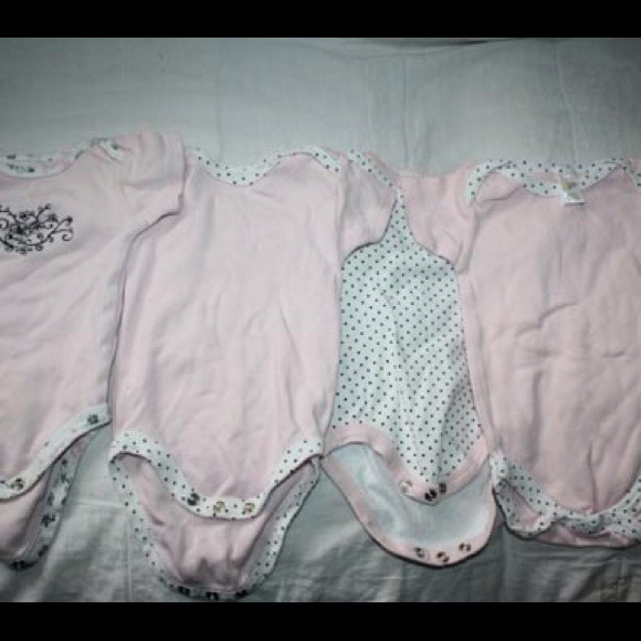 Set of 4 bodysuits for baby girl