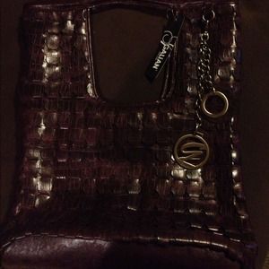 New - cross pattern brown purse.