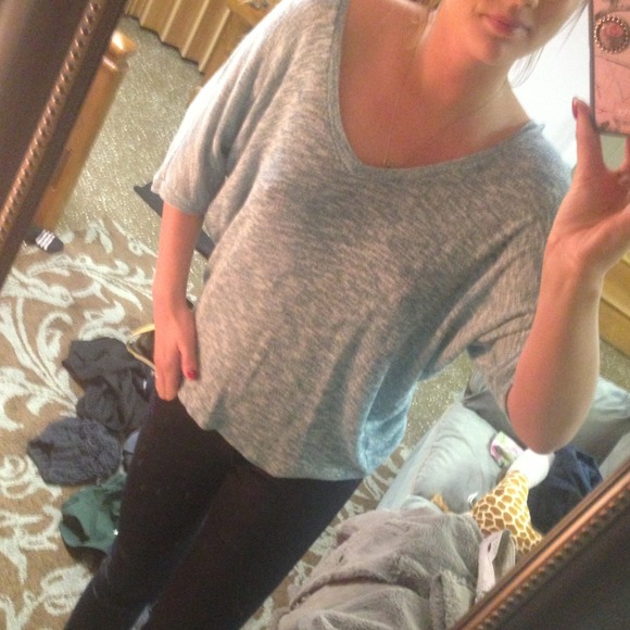 Light weight, flowy blue shirt.