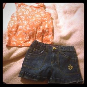 Orange top/dark blue jean