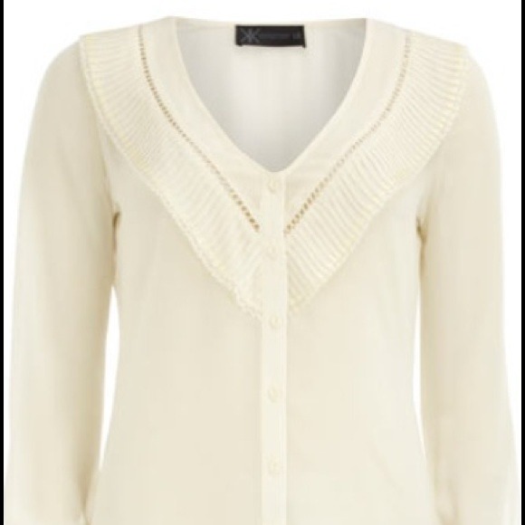 Kardashian cream pleat blouse
