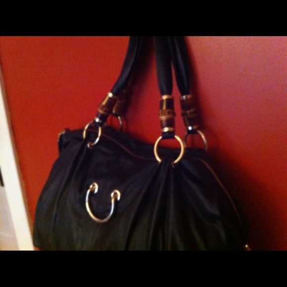 Black purse with bamboo handles