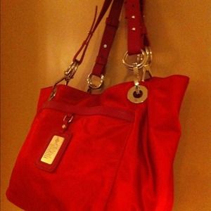 Red purse with gold accent